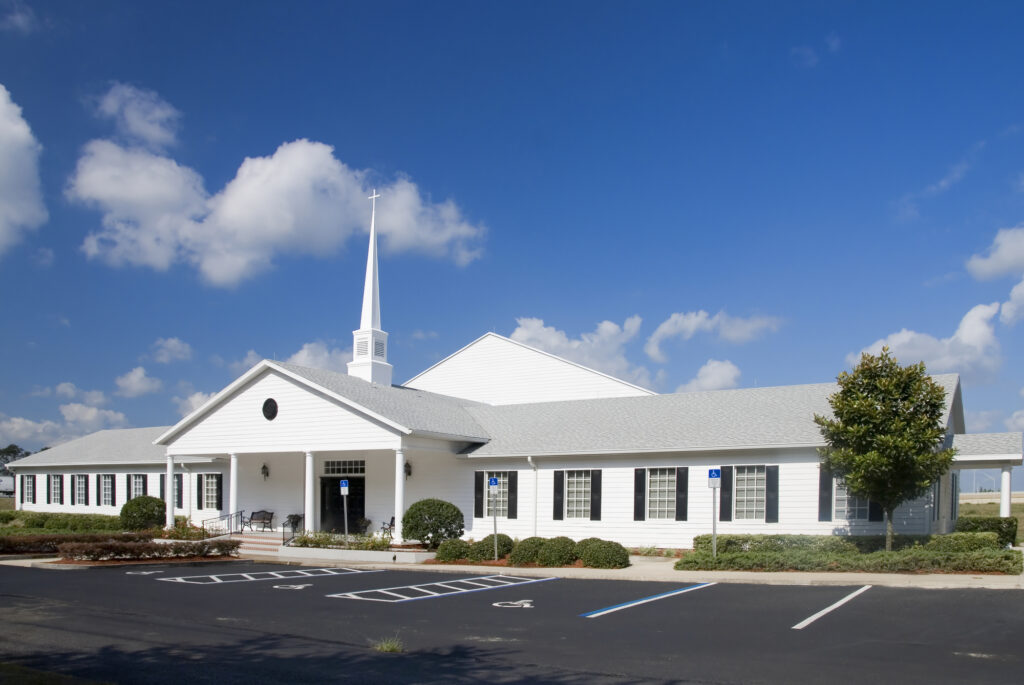 A Church With Blue Sky In Background